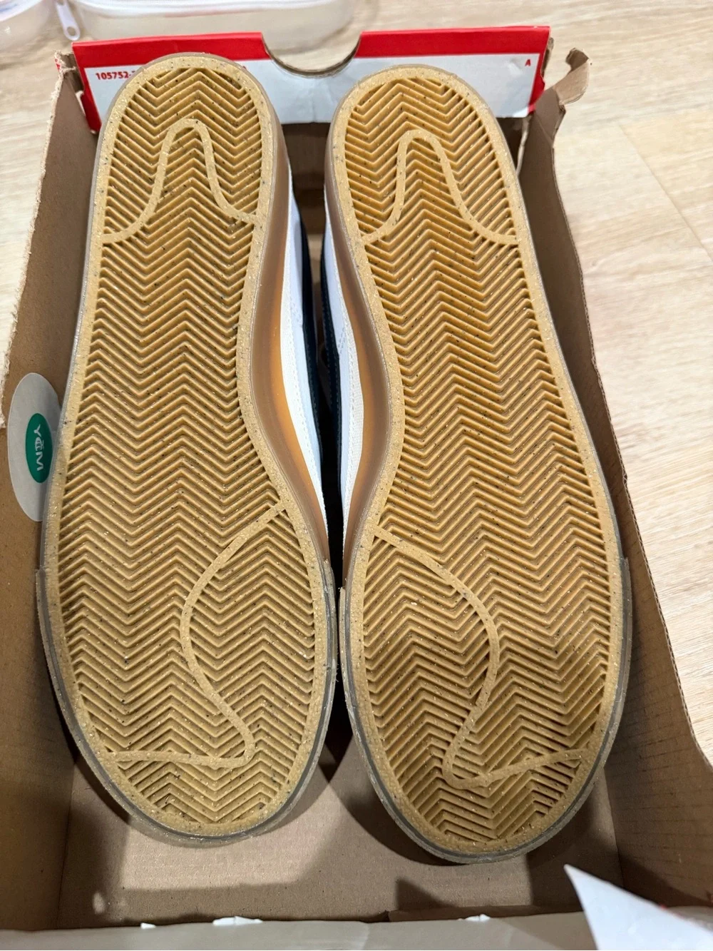 Nike Women's White Sneakers with Black Swoosh and Gum Sole